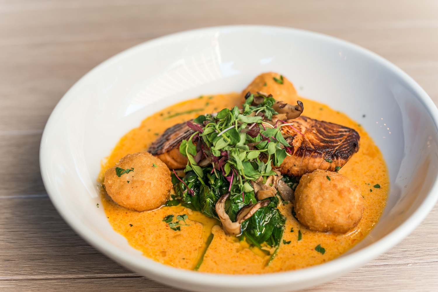 curried salmon and risotto balls beside - Sweetfish Sushi Playa Vista